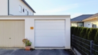 Garage - 2-Zimmer-Eigentumswohnung im EG Hochparterre mit Garage, Gartenlaube und direktem Zugang zum Garten