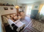 Wohnzimmer - 2-Zimmer-Erdgeschosswohnung in ruhiger Siedlungslage in Pocking zu verkaufen