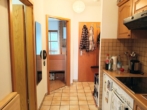 Küchenzeile/Flur - vermietete 2-Zimmer-Eigentumswohnung mit Garage in Bayerbach