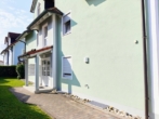 Zugang zum Haus - Traumhafte 3-Zimmer-Eigentumswohnung mit Keller und Garage. Ruhige Lage in Ruhstorf mit Aufzug!