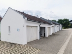 Garage - Traumhafte 3-Zimmer-Erdgeschosswohnung mit Terrasse, Kellerraum und Garage in Kößlarn