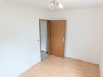 Kinderzimmer/Büro - Traumhafte 3-Zimmer-Erdgeschosswohnung mit Terrasse, Kellerraum und Garage in Kößlarn