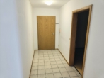 Diele - Traumhafte 3-Zimmer-Erdgeschosswohnung mit Terrasse, Kellerraum und Garage in Kößlarn