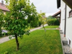 Vorgarten der Wohnanlage - hochwertig ausgestattete 3-Zi.-Eigentumswohnung mit Wintergarten, Terrasse und Tiefgaragenstellplatz