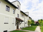 Zugang zur Wohnanlage - hochwertig ausgestattete 3-Zi.-Eigentumswohnung mit Wintergarten, Terrasse und Tiefgaragenstellplatz