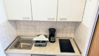 Diele mit Kochnische - TOP-Lage direkt am Freizeitpark Modernes Appartement in Bad Füssing in gut geführtem Haus.