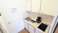 Diele mit Kochnische - TOP-Lage direkt am Freizeitpark Modernes Appartement in Bad Füssing in gut geführtem Haus.