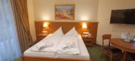 Hotel-Suite im 4 Sterne Hotel SCHWEIZER HOF/ Thermal & Vital Resort Bad Füssing - Schlafbereich