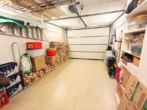 Garage (gefliest) - BARRIEREFREIHEIT – LICHT – RAUM – EXKLUSIVITÄT – Bungalow mit Garage im Kurort Bad Griesbach